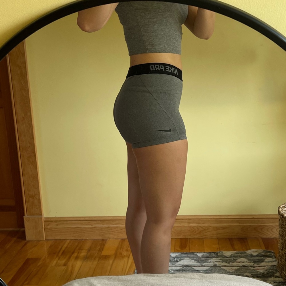 Gray Nike dri-fit spandex shorts. Size medium.